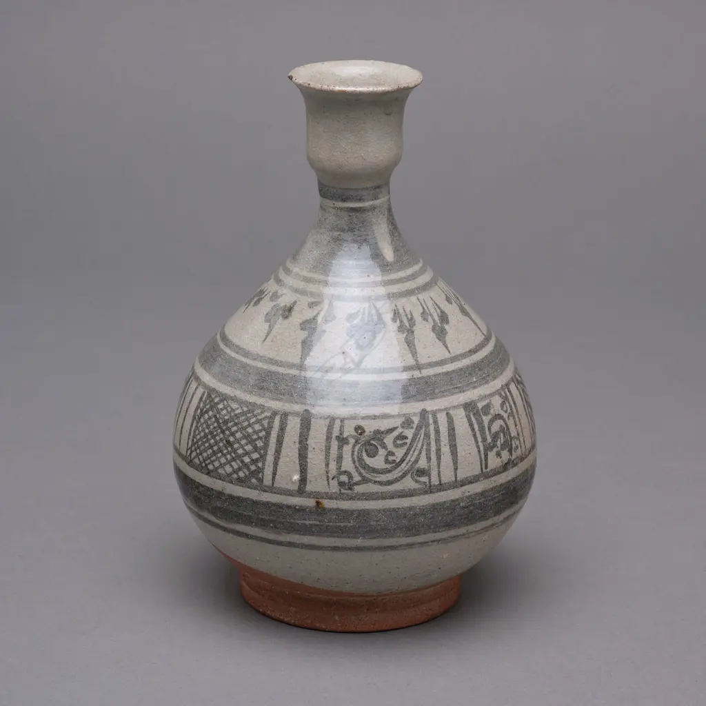 A Sawankhalok stoneware bottle, Image 1++
